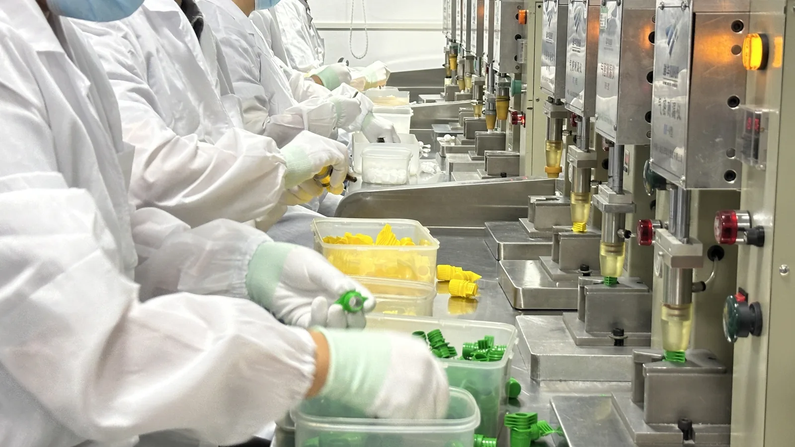 Quality control migration testing of food-grade spout caps in a laboratory