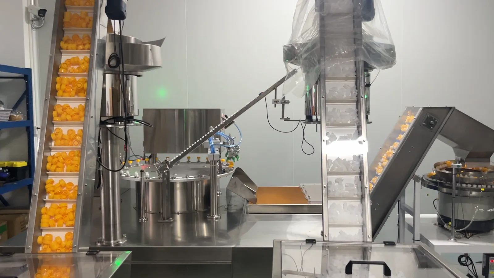 Automated quality-inspection line processing plastic spout caps in a cleanroom workshop
